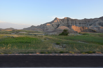 Landscape view of the unusual rock formations at Badlands National Park in South Dakota at sunset