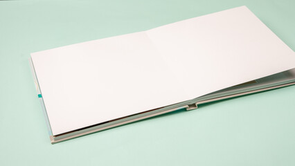 open photo book with white sheets moskup magazine