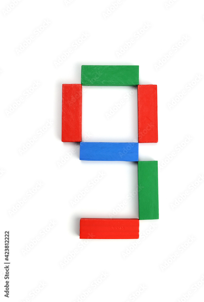 Poster number nine made of colorful constructor blocks bricks isolated on white background