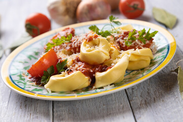 Italian tortellini pasta in tomato sauce