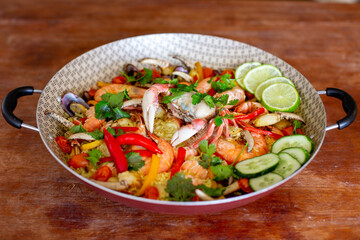 Special paella with crab, shrimp, seafood, lemon  and pepper