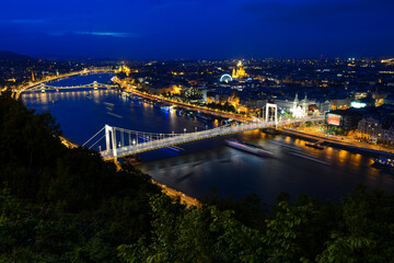 Fototapeta na wymiar Budapest, Hungary - June 20, 2019: Night panoramic view to the city from Citadella