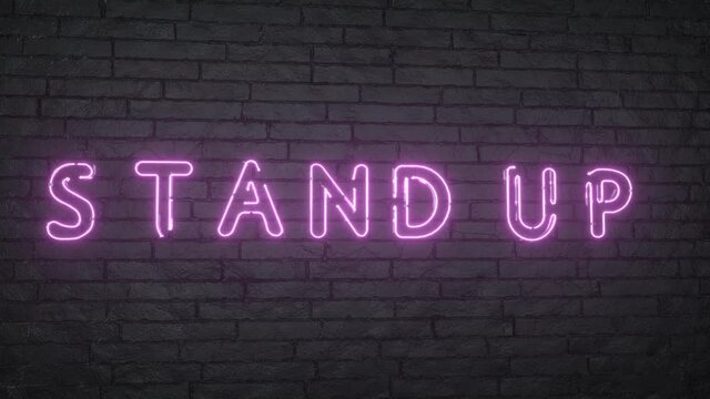 Stand Up neon sign. Glowing Stand Up emblem on black brick wall background