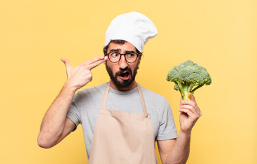 young bearded chef man sad expression