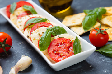 Italian caprese salad with mozzarella cheese
