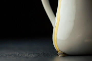 Stack of blueberry pancakes with syrup and fresh blueberries