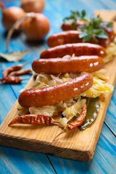 Grilled german sausage links with sauerkraut