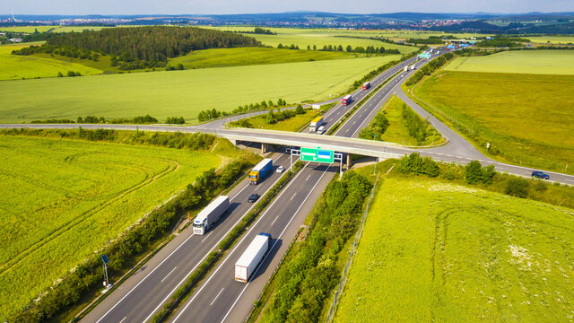 Aerial view of a highway with traffic. Transportation on D5 highway, which leads from Prague to Bavaria. Czech republic, European union.