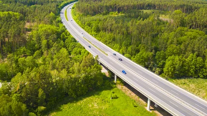 Gordijnen Tsjechië Aerial view of a highway with bridge. Transportation on D5 highway, which leads from Prague to Bavaria. Czech republic, European union.  © peteri