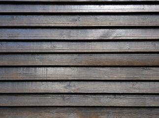 Obraz premium Horizontal dark wooden planks, can be used as background