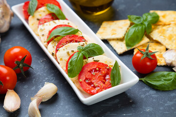Italian caprese salad with mozzarella cheese