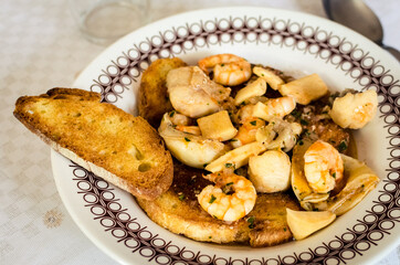 Fish soup with toasted bread