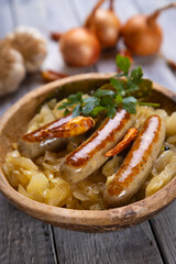 Grilled german sausage links with sauerkraut