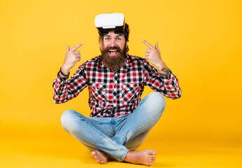 modern handsome bearded guy with unshaven face and stylish hairdo wear casual clothes in vr...