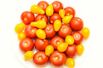 Multi colored heirloom tomatoes isolated on white background