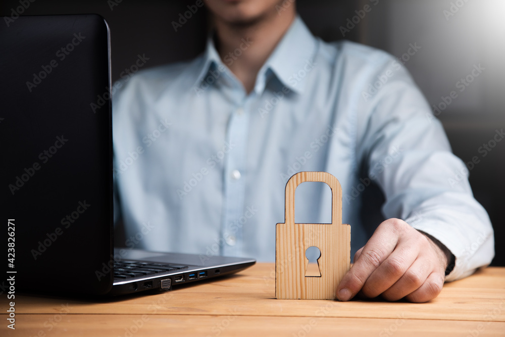 Poster man working computer with lock