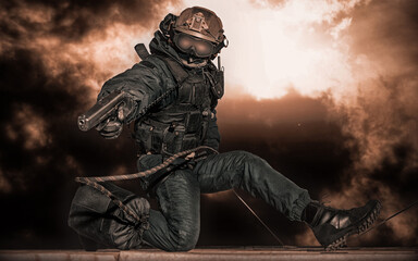 Special forces soldier storms the building. Hostage release concept. SWAT.