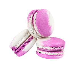 Three purple French macarons isolated on white.