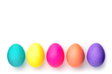 Multi-colored holiday eggs. Eggs on a white background for a postcard