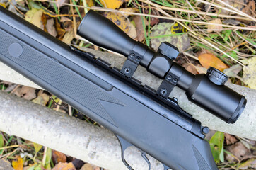 air rifle with telescopic sight , for sport hunting