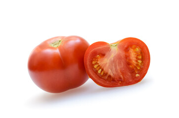 ripe, fresh, natural, multi-colored tomatoes on a white background