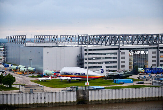 Hamburg / Germany - May 25 2019: Airbus plant Hamburg with Skylink aircraft seen from a ship