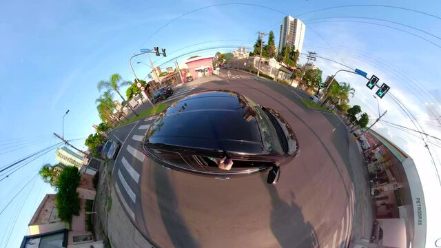 Mini planet image of a car on Piracicaba Avenue, São Paulo, Brazil.