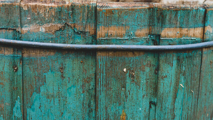 old wooden barrel in peeled paint