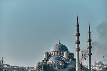 Fototapeta na wymiar Turkey istanbul 03.03.2021. old and ancient ottoman mosques Yeni Cami mosque in istanbul turkey during morning by taken photo from istanbul bosporus.
