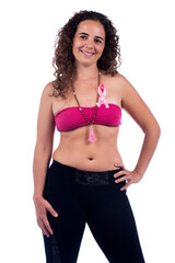 Fototapeta premium Smiling positive young woman with tube pink top