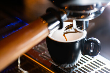 Coffee machine in the dark bar