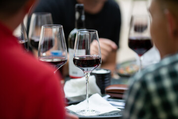 Red wine glass on the table