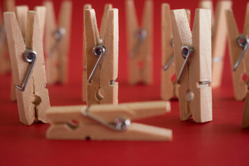 Representation of humans with clothespins. Concept of illness or death and last goodbye. Selective...
