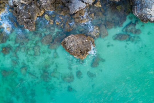 Rock in clear ocean water at the Henderson Cliffs near Perth, Western Australia.