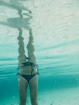 Females legs underwater