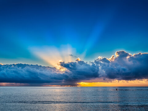 Dramatic sunset sky over sea