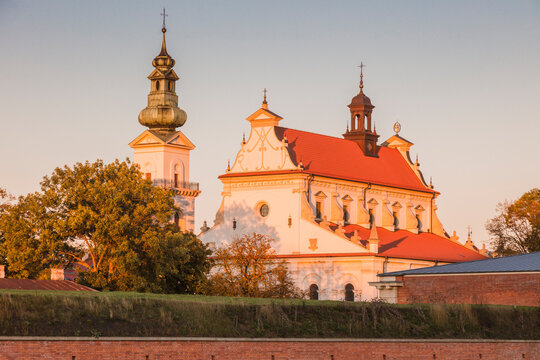 Poland, Lublin, Zamosc, Exterior of church and bell tower