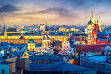 Aerial sunset view of the center of Moscow with historical Museum, The Cathedral of Christ the Savior, government and other. World famous Moscow landmarks for tourism and travel.