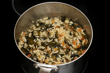 Risotto in pan on stove