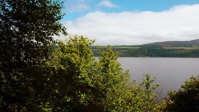Scenic view of the iconic Loch Ness in Scotland, a large, deep, freshwater loch in the Highlands extending for 37 kms