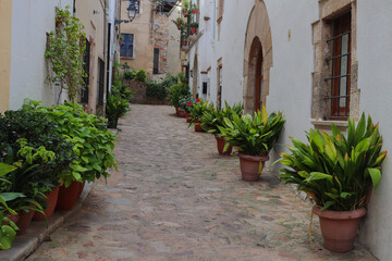 Fototapeta na wymiar Espagne -Costa Brava - Tossa de Mar - Vieille rue de la cité médiévale
