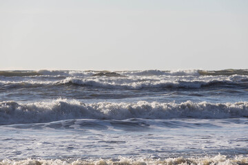 Rough sea on the Pacific Ocean off the coast of Washington state on a sunny day.