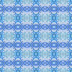 Pattern of cells in blue and cyan tones on a light background