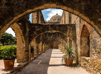 Arch walk way at the San Jose mission in San Antonio, TX USA.