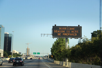 Hurricane warning sign on a Houston freeway.