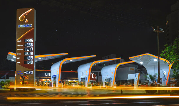 Primax service station, sale of gasoline and gnv fuel. Night view, long exposure, Lima, Peru.