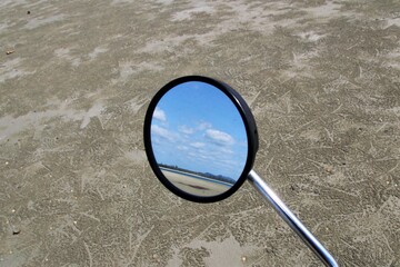 rearview mirror on beach