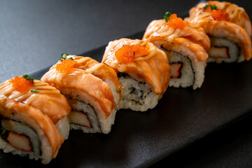 grilled salmon sushi roll with sauce