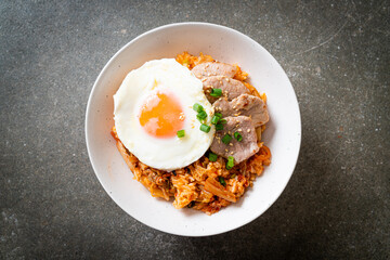 Kimchi fried rice with fried egg and pork
