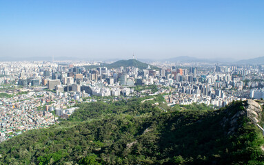 Fototapeta na wymiar Skyline of Seoul from Forested Mountain Viewpoint - Seoul, South Korea